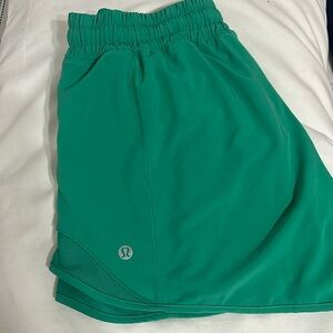 Green lululemon hotty hot high rise shorts